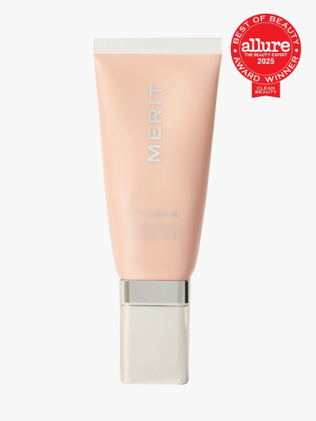 Merit The Uniform Tinted Mineral SPF 45 in branded clear tube with silver cap on light gray background with red Allure Best of Beauty seal in the top right corner